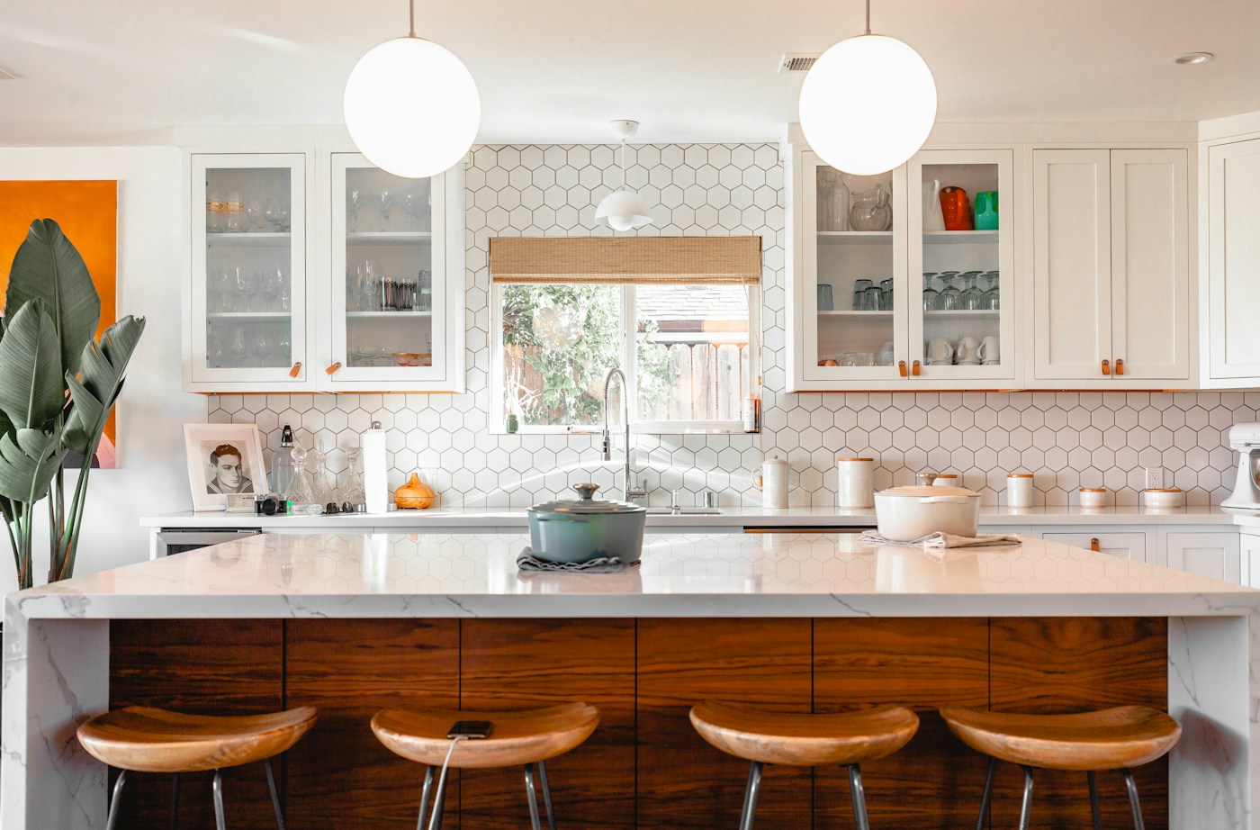 A tidy kitchen sink and cabinets, a starting point for more useful storage